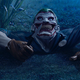 Illustration for article titled Half Of The Jokers Torso Is The Creepiest Lawn Ornament Ever